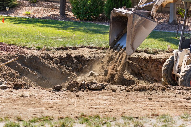 Excavator Working on Slope